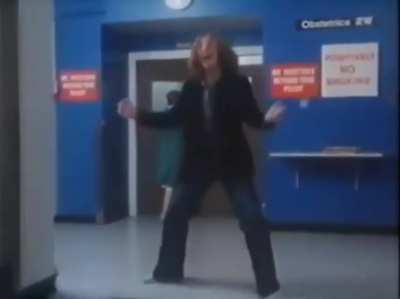John Lennon kicking a trash can and happily screaming 