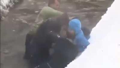 Bulgayrians swimming for the cross on Epiphany, looks like they don't have rivers over there, but only creeks...