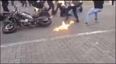 Protesters burning a cop in Guadalajara Mexico protest