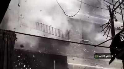 A rocket directly fired from a balcony during a battle. Syria. Undated footage.