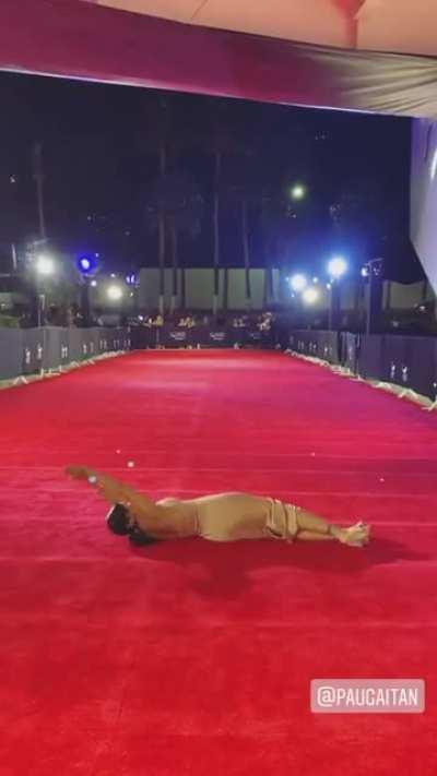 Any idea what is she doing?