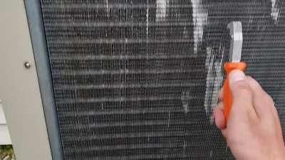 Cooling fin straightener