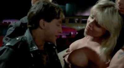 Suzee Slater in Savage Streets (1984)