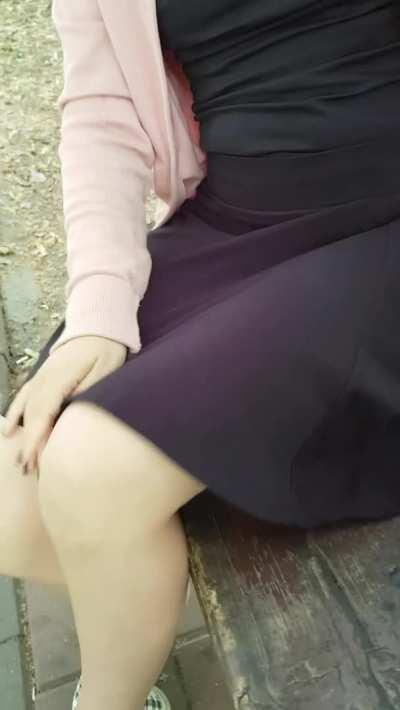 Flashing boobies and pussy on a bench in a park