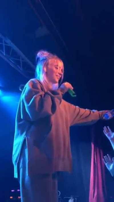 Billie Eilish pauses performance to help fan that was passing out