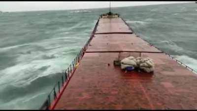 Cargo ship snapped in two while at anchor in heavy seas off Turkey.