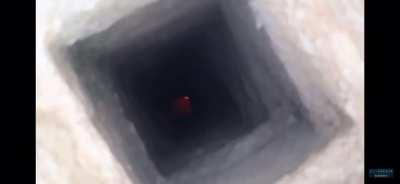 Throwing a molotov down a hole...