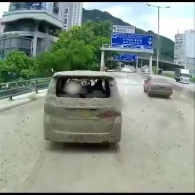 Brake checking a taxi.