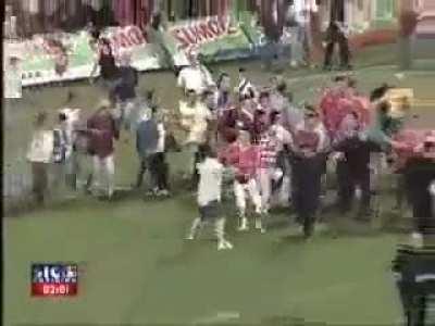 Guy on the right hitting him with a stick is the first one to run away