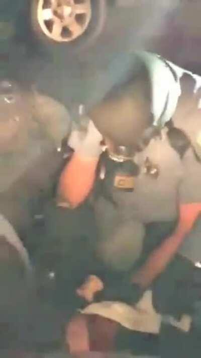 Two Colorado Springs Police Officers Recorded Beating Protester on the Ground