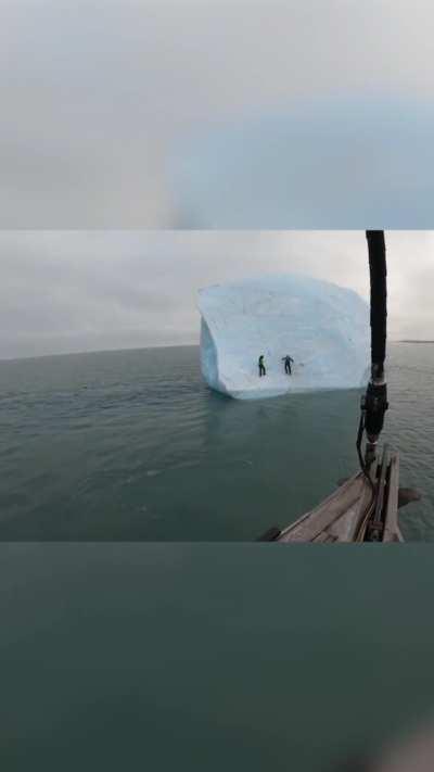 Climbing on an iceberg and it rolls over