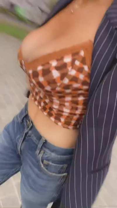 Tits in tiny top, walking