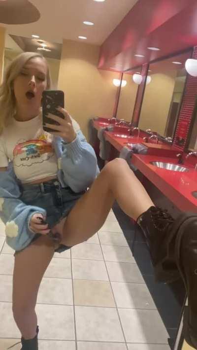 Getting myself off in the movie theater bathroom, cause the movie was bad & I was horny