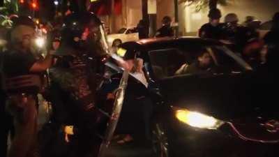 An alert about a 9pm curfew enforcement was sent to Atlanta residents at approximately 9:13pm. Police stopped them, broke the window to their car, tazed them, tackled them and arrested them.