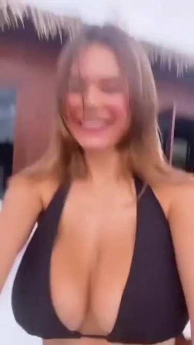 Ashley bounces on a trampoline