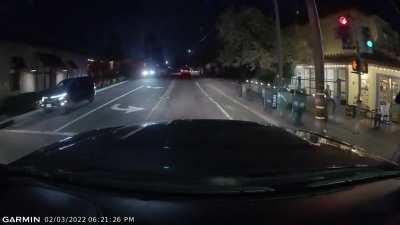 Dude ran a red light… on a skateboard