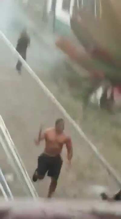 Brazilian security forces uses non-lethal on machete wielding perpetrator with no effect, leading to a devastating attack on one of the officers