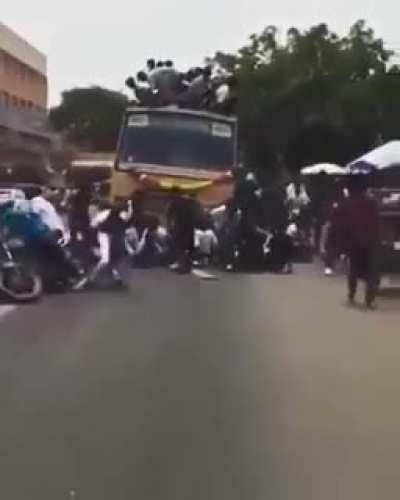 Traveling on top of a bus. WCGW?