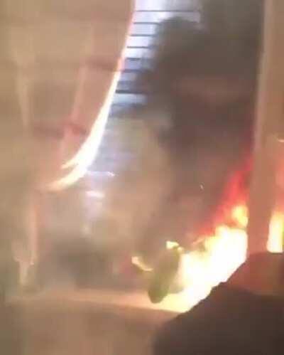 Shooting an ariel flare outside an apartment window