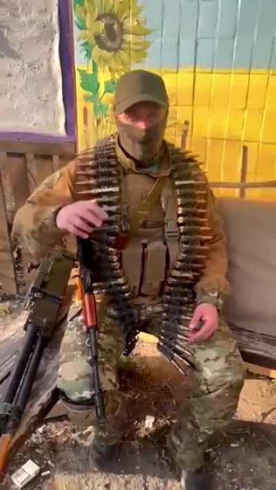 Americans fighting in Ukraine liberate a 50 caliber machine gun from a destroyed Russian tank