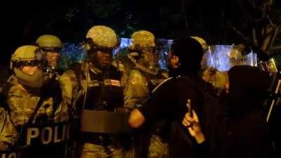 This was powerful. You can see the guy crying behind the shield. Some people are just trapped and don't know what to do.