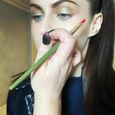 Getting her makeup done