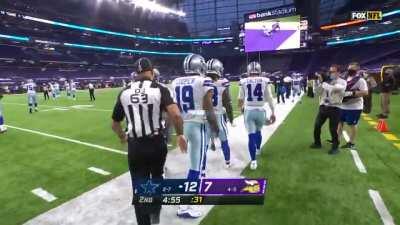 Rookie receiver CeeDee Lamb contorts his body while looking over his shoulder before catching a touchdown pass