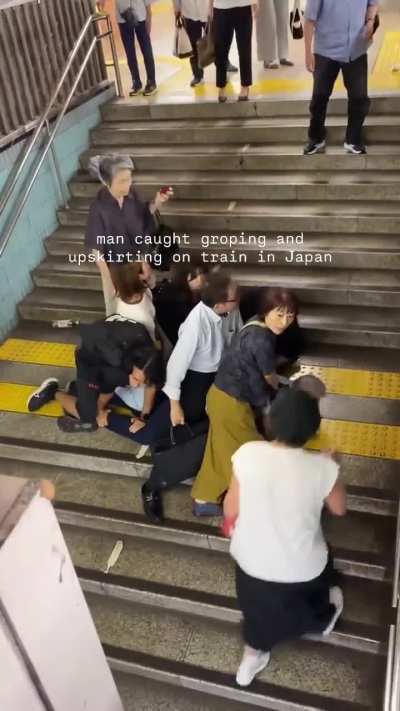 People come together to stop a man who was caught groping and taking unsolicited photos of women on a train in Japan.