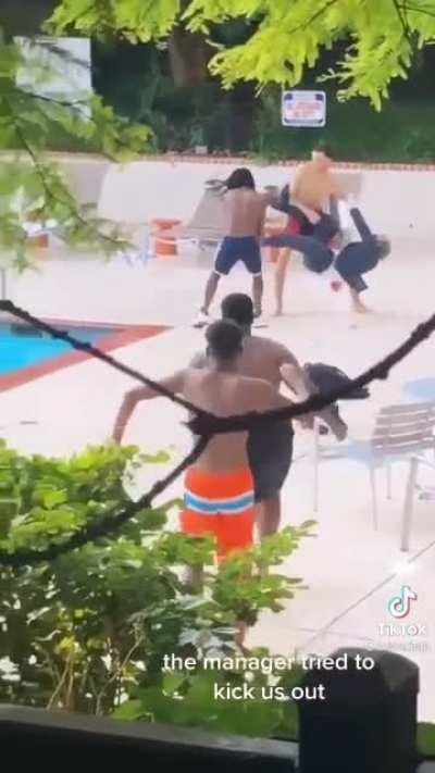 Manager tries to kick them out of the pool so they threw him in