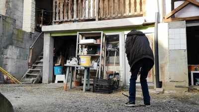 My uncle and I keeping a firework stuck in land