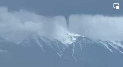 First time ever a Twister was filmed touching down the top of a mountain 