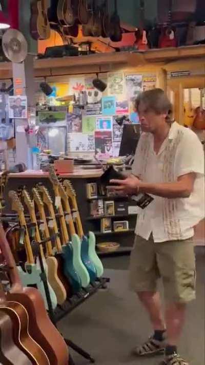 When you play Blue Oyster Cult in a guitar store