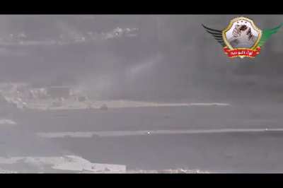 Liwa al-Tawhid machine gun catches a group of Syrian Army fighters crossing the street - 2012