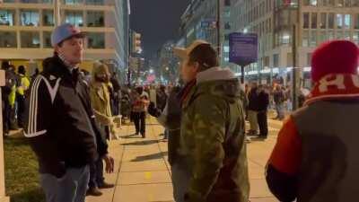 Proud boy rages at a guy trying to have a civil talk, while another punches a street sign.