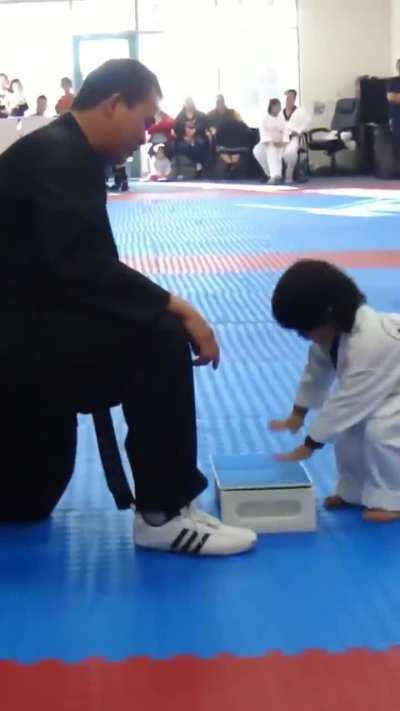 Kid tries to break boards!