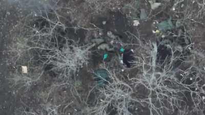 Ukrainian drone and indirect helicopter fire hitting Russian soldiers on the Bakhmut front