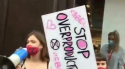 H&M store on Oxford Street, London was forced to close this afternoon after Extinction Rebellion stripped off their clothes and glued their hands to the shop window .