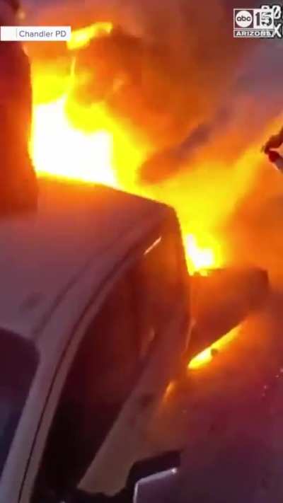 Body cam footage of first responders pulling woman from burning truck - Chandler, AZ