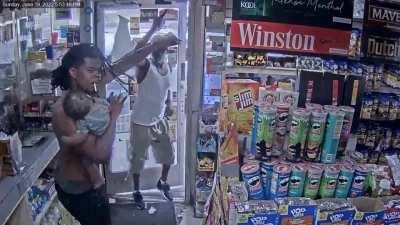 Man points gun at father & baby (man not charged, victim didn't show up to court)