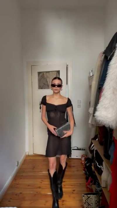 Showing her look on Tiktok 