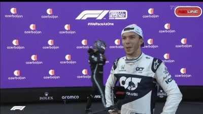 Hamilton forgets to take his shoes off magic before heading to the press pen.