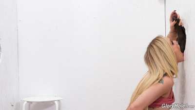 Kali swallowing a big black cock in a gloryhole