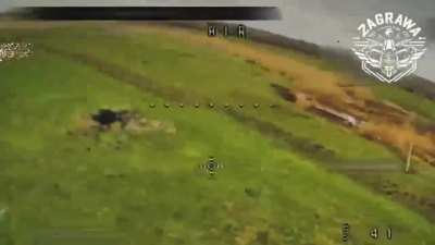 A Ukrainian FPV spots and engages a wounded Russian walking across a field, dodging swings from the Soliders makeshift cane.