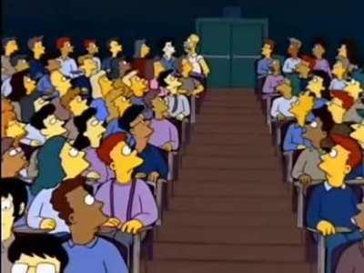 Homer Simpson can't stop laughing in a lecture room, the other students witness the eventin awkward silence.