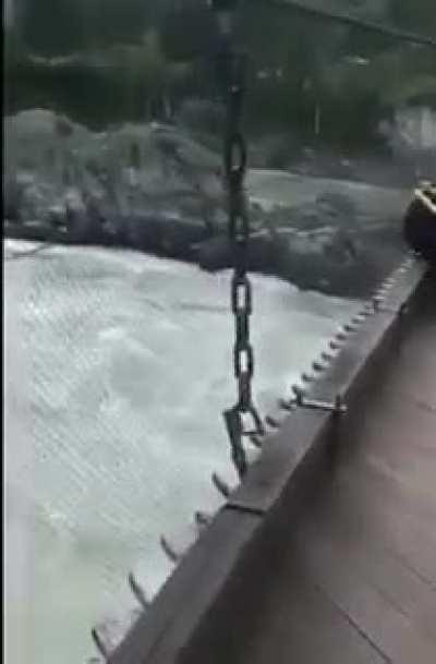 WCGW riding an ATV on the bridge