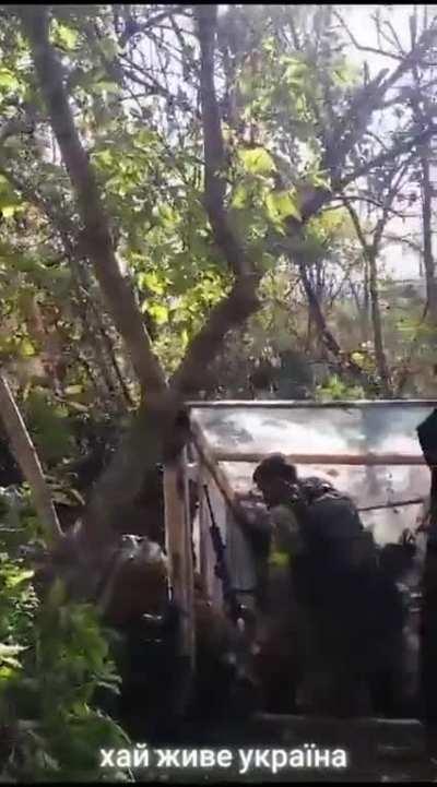 Colombian volunteers fighting as part of the Carpathian Sich Battalion ðºð¦ pray before the upcoming attack.