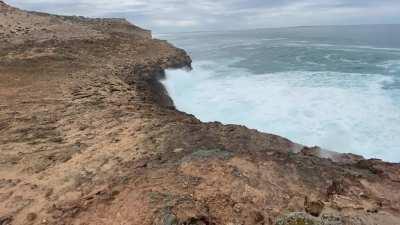 The sound of compressed air and venting sea spray hissing through the cliff face sounds like a dragons snarl.