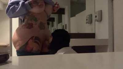 Thicc tgirl getting head in a bathroom