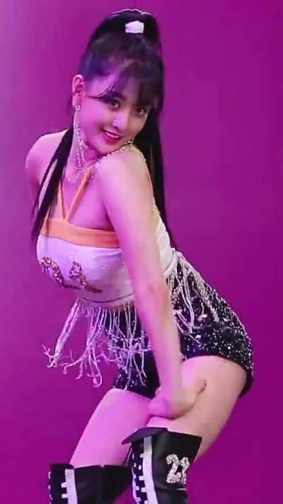 Jihyo - high ponytail, black thigh-high boots, shorts, white & yellow top, the feels outfit