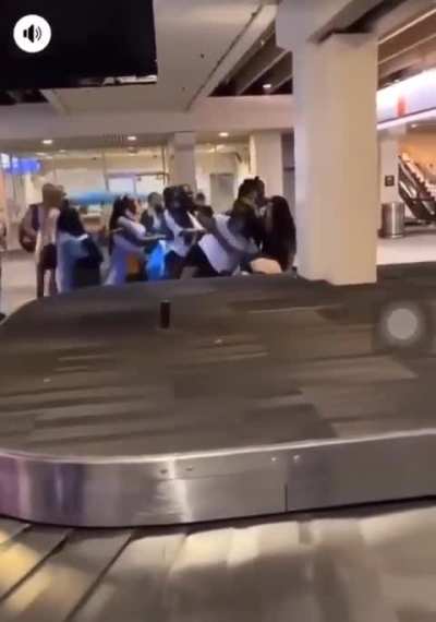 a fight breaks out at the airport